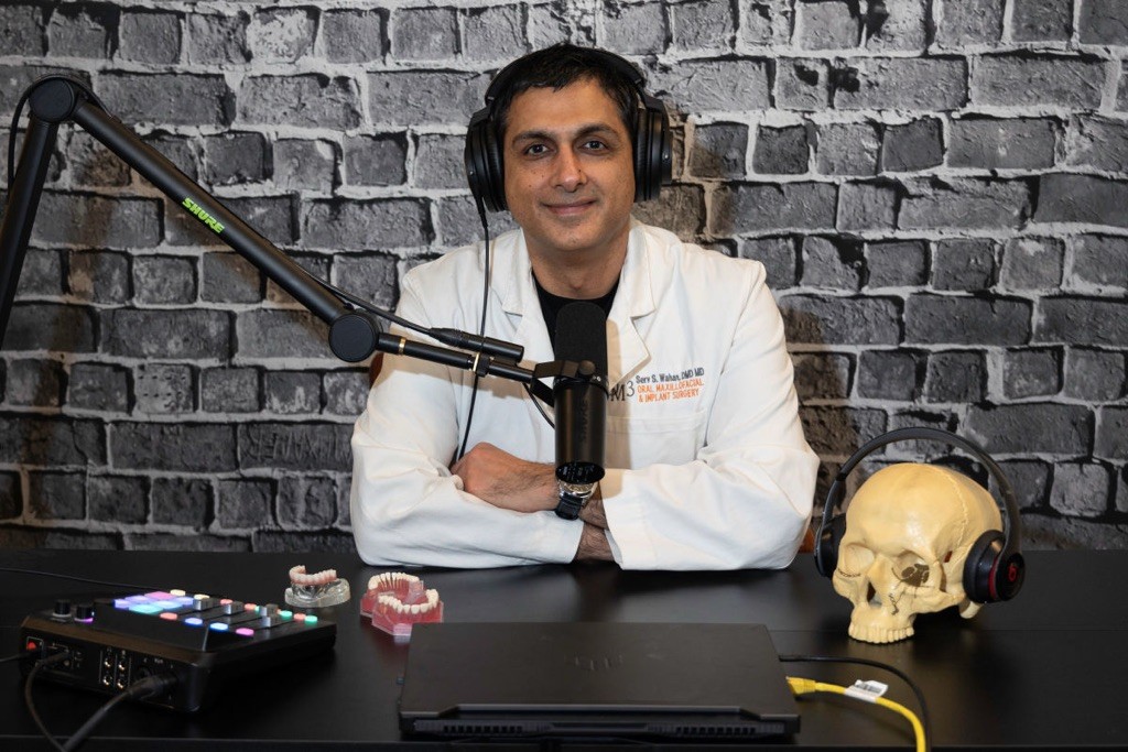 Dr Wahan with microphone