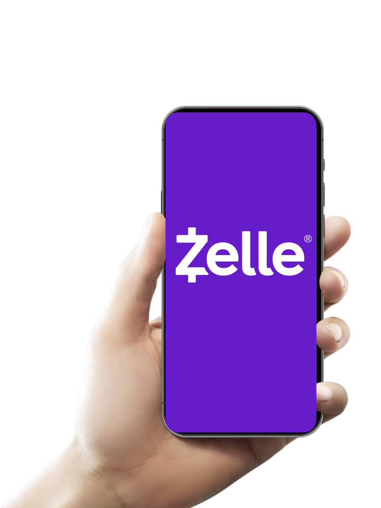 hand holding a phone with zelle on it
